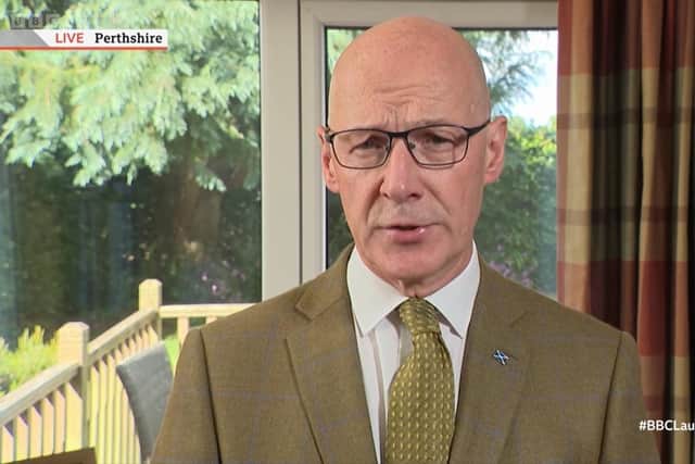 John Swinney said he was 'confident' the SNP has not broken rules over the use of Holyrood-funded stamps