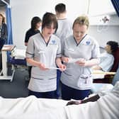 First Minister Nicola Sturgeon watches students on a mock hospital ward at Queen Margaret University in 2016 (Picture: Jeff J Mitchell/Getty Images)