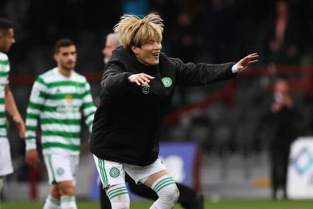 Celtic's Kyogo Furuhashi celebrates at full time after the win against Ross County.