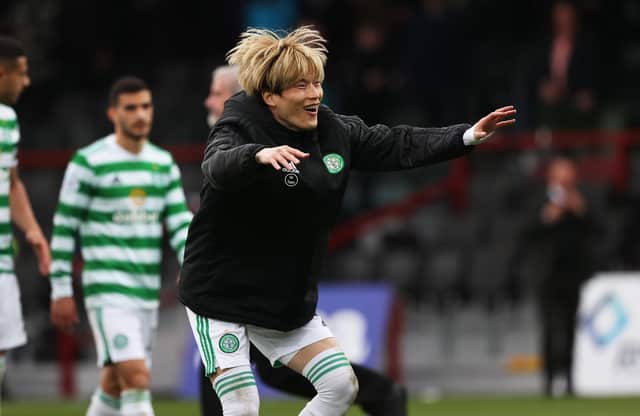 Celtic's Kyogo Furuhashi celebrates at full time after the win against Ross County.