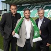 Lee Johnson is unveilled as the new Hibs manager by owner Ron Gordon, right, and CEO Ben Kensell.
