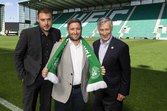Lee Johnson is unveilled as the new Hibs manager by owner Ron Gordon, right, and CEO Ben Kensell.