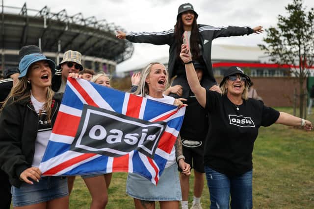Oasis fans arrive ahead of Oasis LIVE '25 at Murrayfield Stadium (Picture: Jeff J Mitchell/Getty Images)