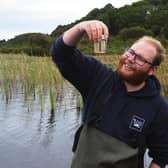 Adam Button, invertebrate keeper for the RZSS, was one of the team who helped collect leeches from a Scottish loch to begin the pioneeering reintroduction project