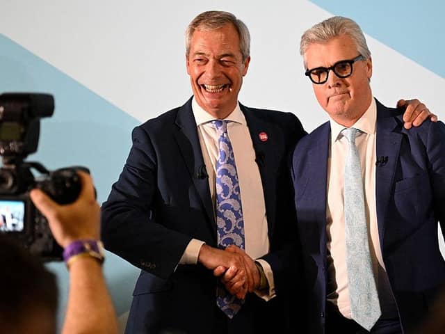 Reform UK leader Nigel Farage and new recruit Malcolm Offord (Picture: Lesley Martin / AFP via Getty Images)