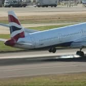 The hair-raising moment a British Airways plane’s tail hit the runway at London Heathrow airport during an aborted landing.