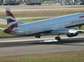 The hair-raising moment a British Airways plane’s tail hit the runway at London Heathrow airport during an aborted landing.