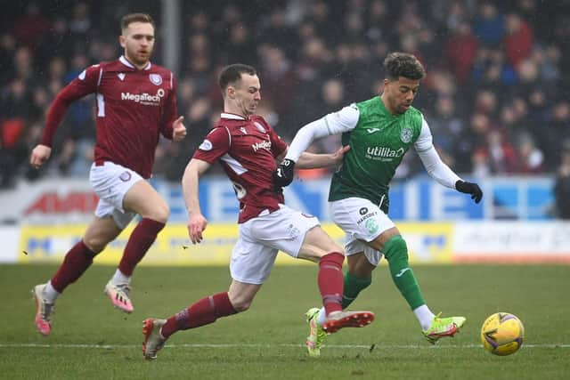 Jasper in full flight against Arbroath's Chris Hamilton