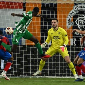 Aris Limassol's Alex Moucketou-Moussounda heads home the opener against Rangers in Cyprus.