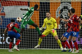 Aris Limassol's Alex Moucketou-Moussounda heads home the opener against Rangers in Cyprus.