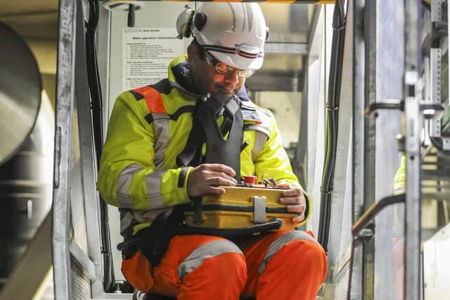 BEAR Scotland major bridges gantry structural health monitoring system manager Dave McAra at the controls of the monorail shuttle. (Photo by Lisa Ferguson/The Scotsman)