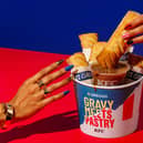 Greggs and KFC have teamed up to see what UK consumers think of sausage rolls drenched in gravy. Picture: Greggs/PA Wire