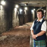 Glasgow Central Station Museum curator and tour guide Jackie Ogilvie on the disused platform. Picture: John Devlin