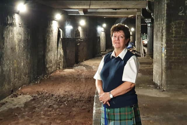 Glasgow Central Station Museum curator and tour guide Jackie Ogilvie on the disused platform. Picture: John Devlin