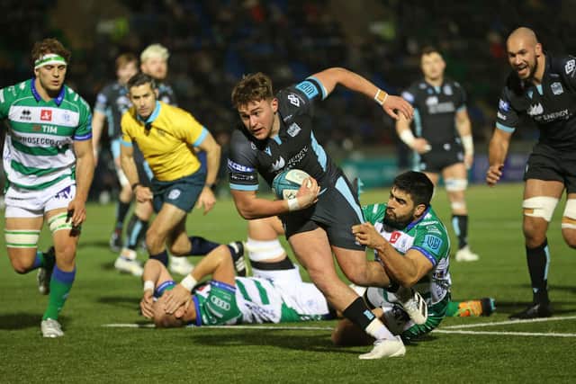 Glasgow Warriors' Ollie Smith runs through for the opening try against Benetton.
