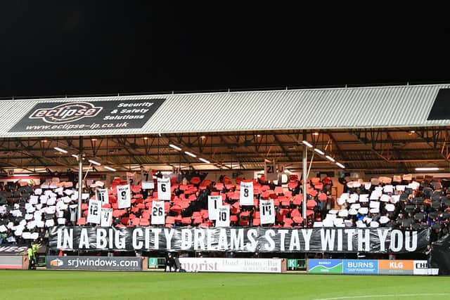 Dunfermline fans hold up a banner before the game against their arch-rivals.