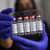Vials of the Oxford/AstraZeneca coronavirus vaccine at Copes Pharmacy and Travel Clinic in Streatham, south London. Picture date: Friday April 9, 2021.
