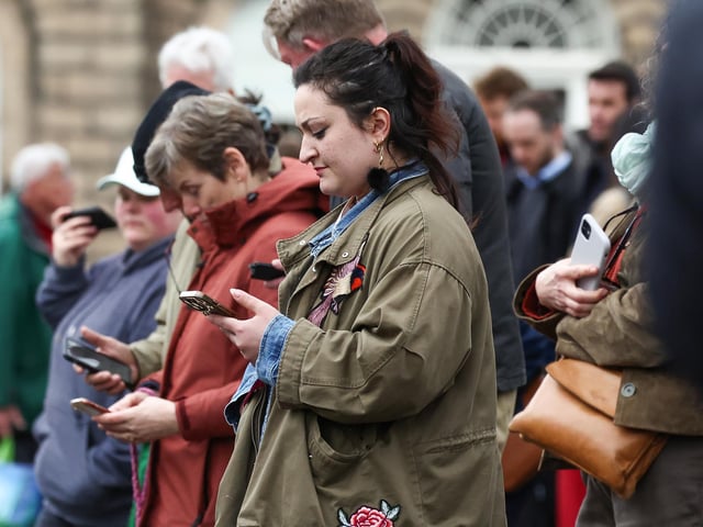 Members of the public gather outside Bute House, where Humza Yousaf announced his resignation as First Minister. Mr Yousaf was in office for just 398 days after the previous leader Nicola Sturgeon stood down in March 2023. Picture: Jeff J Mitchell/Getty Images