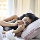 The list of Covid symptoms has been updated to include further ailments. Photo: Andrea Piacquadio / Pexels / Canva Pro.