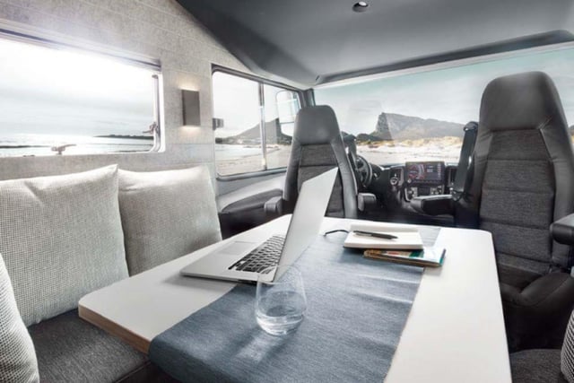The open-plan living space has a cosy face-to-face lounge area and enough room for five people - including on an ingenious optional bench seat that transforms from a
safe passenger seat into a couch.