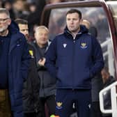 St Johnstone manager Craig Levein (L) and assistant manager Andy Kirk look on during the defeat by Hearts.