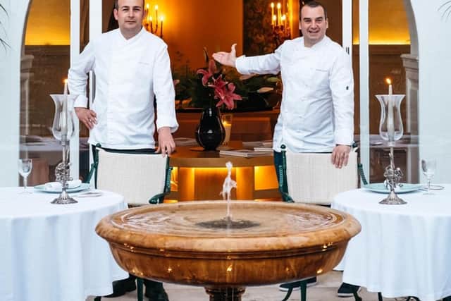 Two-times Michelin starred chef Romain Fornell (right) welcomes guests to Candlelight at Hostal de la Gavina where the forgotten art of dining by candlelight and a tasting menu of impeccable quality are to the fore.