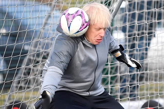 The grim prospect of Boris Johnson staging more football photo-ops looms large in light of his World Cup bid announcement. (Picture: Toby Melville/Getty Images)