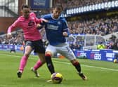 Rangers left-back Borna Barisic tussles with Raith winger Aidan Connelly during the Scottish Cup quarter-final tie at Ibrox on Sunday. (Photo by Rob Casey / SNS Group)