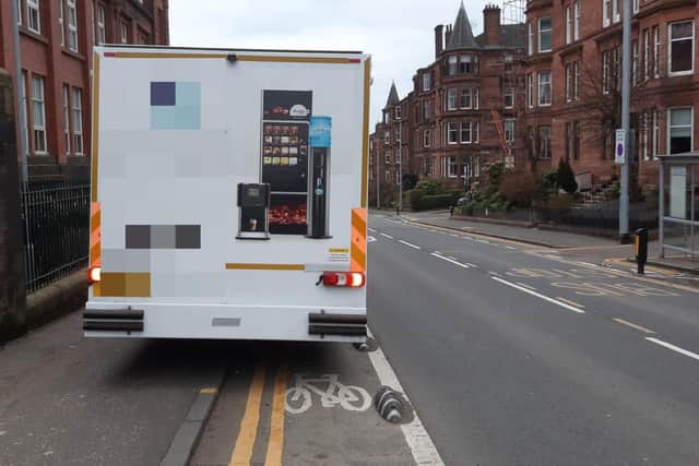 The segregated cycle lane is clearly marked with bike symbols and "armadillo" studs. (Picture: The Scotsman)