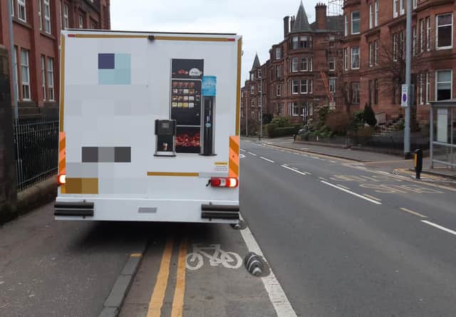 The segregated cycle lane is clearly marked with bike symbols and "armadillo" studs. (Picture: The Scotsman)