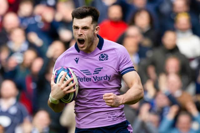 Blair Kinghorn celebrates his final try against Italy in Scotland's 26-14 Six Nations win.