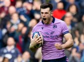 Blair Kinghorn celebrates his final try against Italy in Scotland's 26-14 Six Nations win.