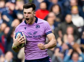 Blair Kinghorn celebrates his final try against Italy in Scotland's 26-14 Six Nations win.