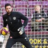 Hearts and Scotland goalkeeper Craig Gordon suffered a double leg break on Christmas Eve last year.  (Photo by Mark Scates / SNS Group)