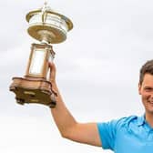 Craigielaw's Angus Carrick with the trophy after his win in the 2021 Scottish Amateur Championship at Murcar Links. Picture: Scottish Golf.