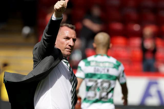 Celtic manager Brendan Rodgers salutes the Celtic fans following the win over Aberdeen.