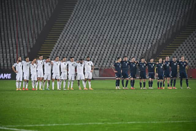 Serbia's players and Scotland's players wait before the penalty shootout during the Euro 2020 play-off qualification football match between Serbia and Scotland at the Red Star Stadium in Belgrade on November 12, 2020. (Photo by ANDREJ ISAKOVIC / AFP) (Photo by ANDREJ ISAKOVIC/AFP via Getty Images)