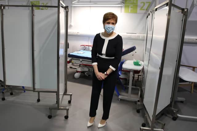 First Minister Nicola Sturgeon views a cubicle during a visit to the NHS Louisa Jordan at the SEC, Glasgow. Photo credit should read: Andrew Milligan/PA Wire