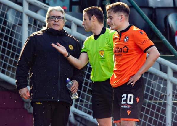 Partick manager Ian McCall speaks with referee Steven McLean after the incident involving Brian Graham