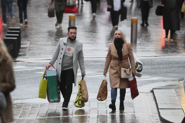 Members of the public carry shopping in Buchanan Street in Glasgow.