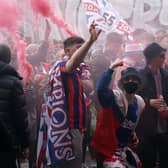 Police have arrested more than 50 people in connection with disorder in Glasgow’s George Square.