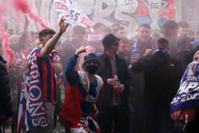 Police have arrested more than 50 people in connection with disorder in Glasgow’s George Square.