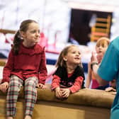Edinburgh Leisure staff lead a childrens coaching session.