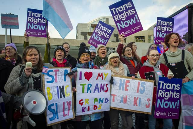 Campaigners in support of Scotland's gender reforms demonstrate outside the Scottish Parliament. Image: Lisa Ferguson/National World.