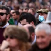 Face coverings will no longer be required in shops, restaurants or on public transport from April 18. Photo by Adrian DENNIS / AFP) (Photo by ADRIAN DENNIS/AFP via Getty Images