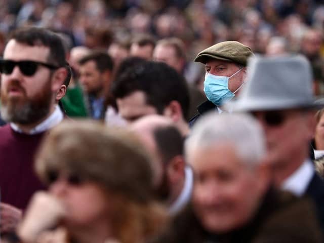 Face coverings will no longer be required in shops, restaurants or on public transport from April 18. Photo by Adrian DENNIS / AFP) (Photo by ADRIAN DENNIS/AFP via Getty Images