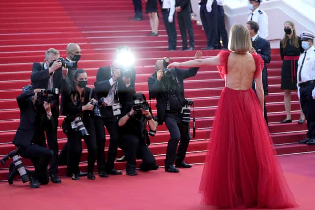 Rosamund Pike poses for photographers upon arrival at the awards ceremony . (AP Photo/Vadim Ghirda)