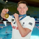 Duncan Scott with his Olympics medals during the ChangeMaker event at the Peak Leisure Centre, Stirling. The ChangeMaker initiative is a partnership between the National Lottery’s operator, Allwyn, Team GB, ParalympicsGB and UK Sport. (Picture: Jane Barlow/PA Images)
