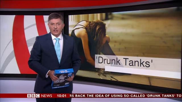 Viewers saw Simon McCoy holding a packet of A4 paper instead of a tablet while presenting an news story on BBC One. Image: BBC