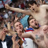 England fans cheer before the start of the EURO 2020 final between Italy and England at Wembley (Photo by Carl Recine / POOL / AFP) (Photo by CARL RECINE/POOL/AFP via Getty Images)